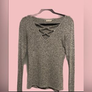 Grey long sleeve top with crossed patter in front